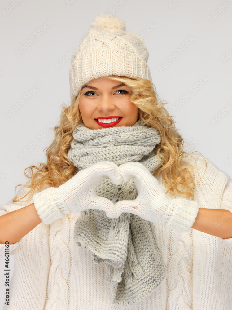 Sticker beautiful woman in a winter clothes showing heart