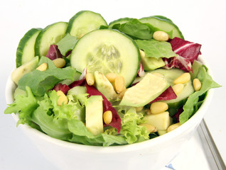 Arugula and spinach salad with cedar nuts