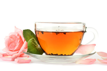 cup of tea with rose isolated on white