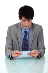 Businessman reading a report