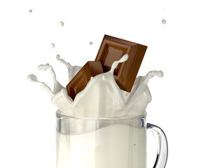 Two chocolate blocks falling into a glass mug full of fresh milk