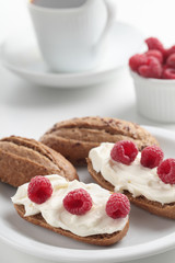 Sandwiches with soft cheese and raspberry