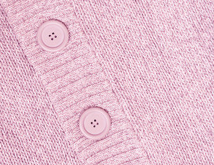 background with Knitted pink sweater with buttons  Knitted woole