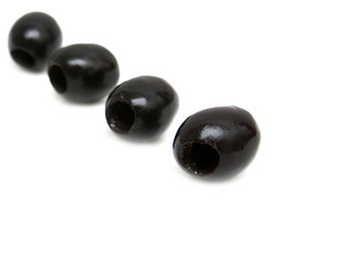 Black olives on a white background