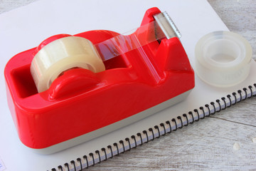 Scotch tape and a notebook.