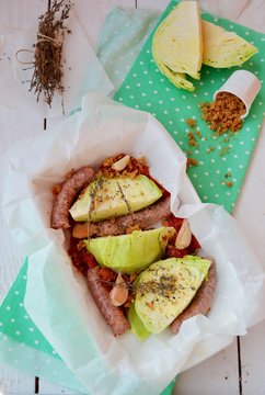 Baking cabbage with tomatoes  and small sausage
