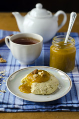 Shortbread cookies with plum jam, and oat flakes