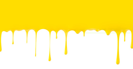 Yellow paint dripping isolated on white background