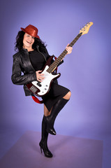Fototapeta premium Pretty woman with guitar