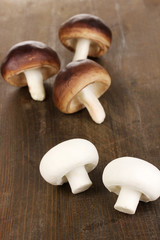Fresh mushrooms on wooden table close-up