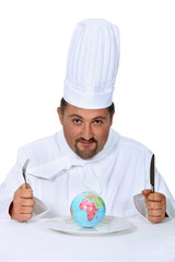 Chef eating planet earth