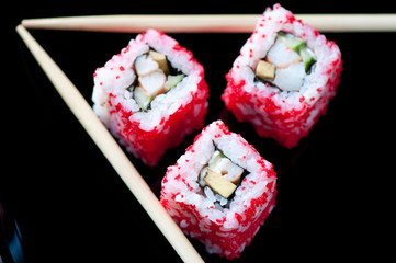 California rolls and chopsticks, view from above
