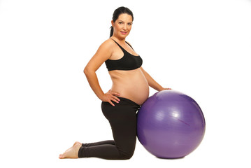 Fototapeta na wymiar Pregnant doing exercises