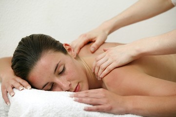 Fototapeta na wymiar Woman enjoying shoulder massage