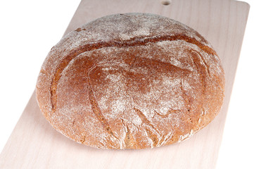 fresh rye bread on a white background