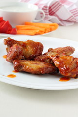 Hot chicken wings with vegetables