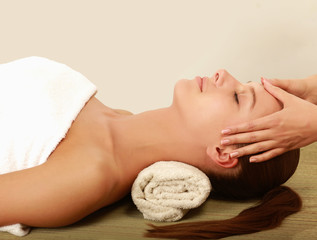 An attractive woman getting spa treatment