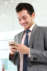 businessman texting a message