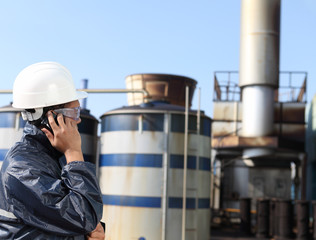 industrial engineer communicate via mobile phone