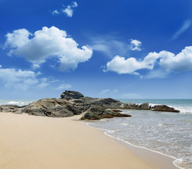 stones in the waves on ocean coast
