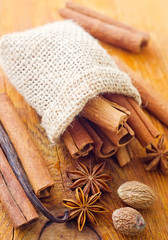Aroma spice in the sack on the wooden board