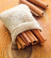 Aroma cinnamon sticks on the wooden board