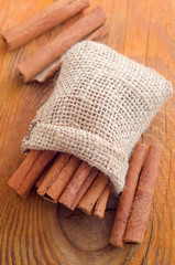 Aroma cinnamon sticks on the wooden board