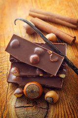 Chocolate and aroma spice on the wooden board