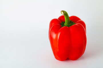 a red pepper on white background