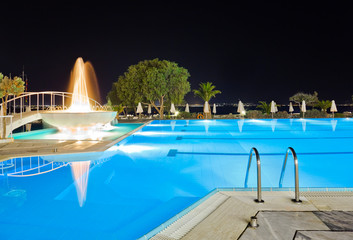 Water pool and fountain at night