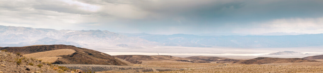 Obraz premium Death Valley with dramatic cloudy sky. Desert. USA, California.