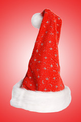 Santa Hat over a red background