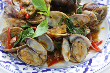 stir fried clams with roasted chili paste and thai sweet basil