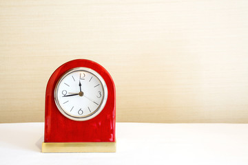 Alarm clock on white table