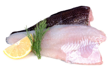 Raw cod fish fillets with citron and parsley