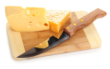 Cheese on cutting board with knife isolated on white