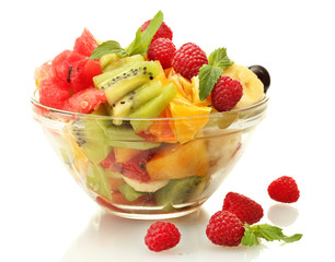 fresh fruits salad in bowl  and berries, isolated on white