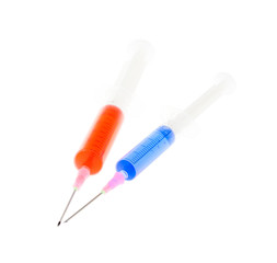 Fototapeta premium Syringes with blue and red liquid