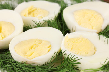 Boiled eggs on color background