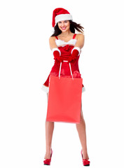 Santa helper Christmas girl with shopping bags.