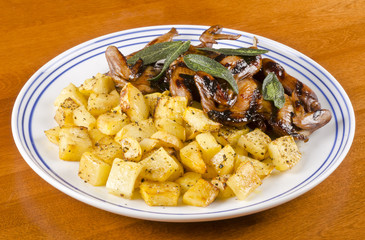 Barbecued Quails with Roasted Rutabaga and Crispy Sage Leaves