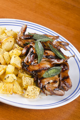 Barbecued Quails with Roasted Rutabaga and Crispy Sage Leaves