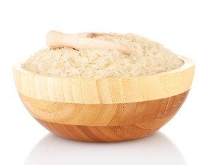 rice in a  brown wooden plat, isolated on white