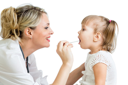 doctor examining baby isolated on white background