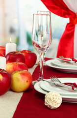 beautiful holiday table setting with apples, close up