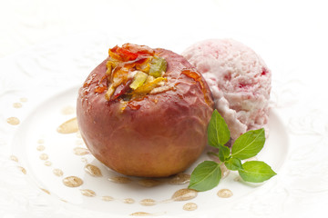 Baked apple with nuts on white