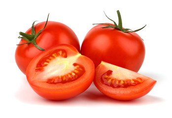 Red tomato vegetable with cut closeup isolated on white backgrou