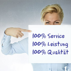 Woman shows: 100% service, performance and quality