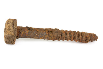 Rusty old bolt on white