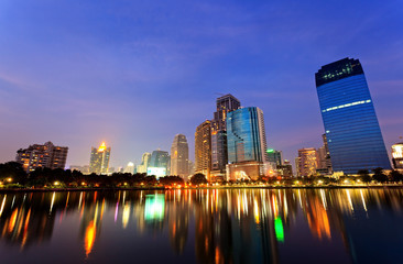 Bangkok in evening, reflection of buildings in water